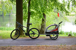 Remorcă de bicicletă cu amortizor 2 persoane + JOGGER roșu + gratuit